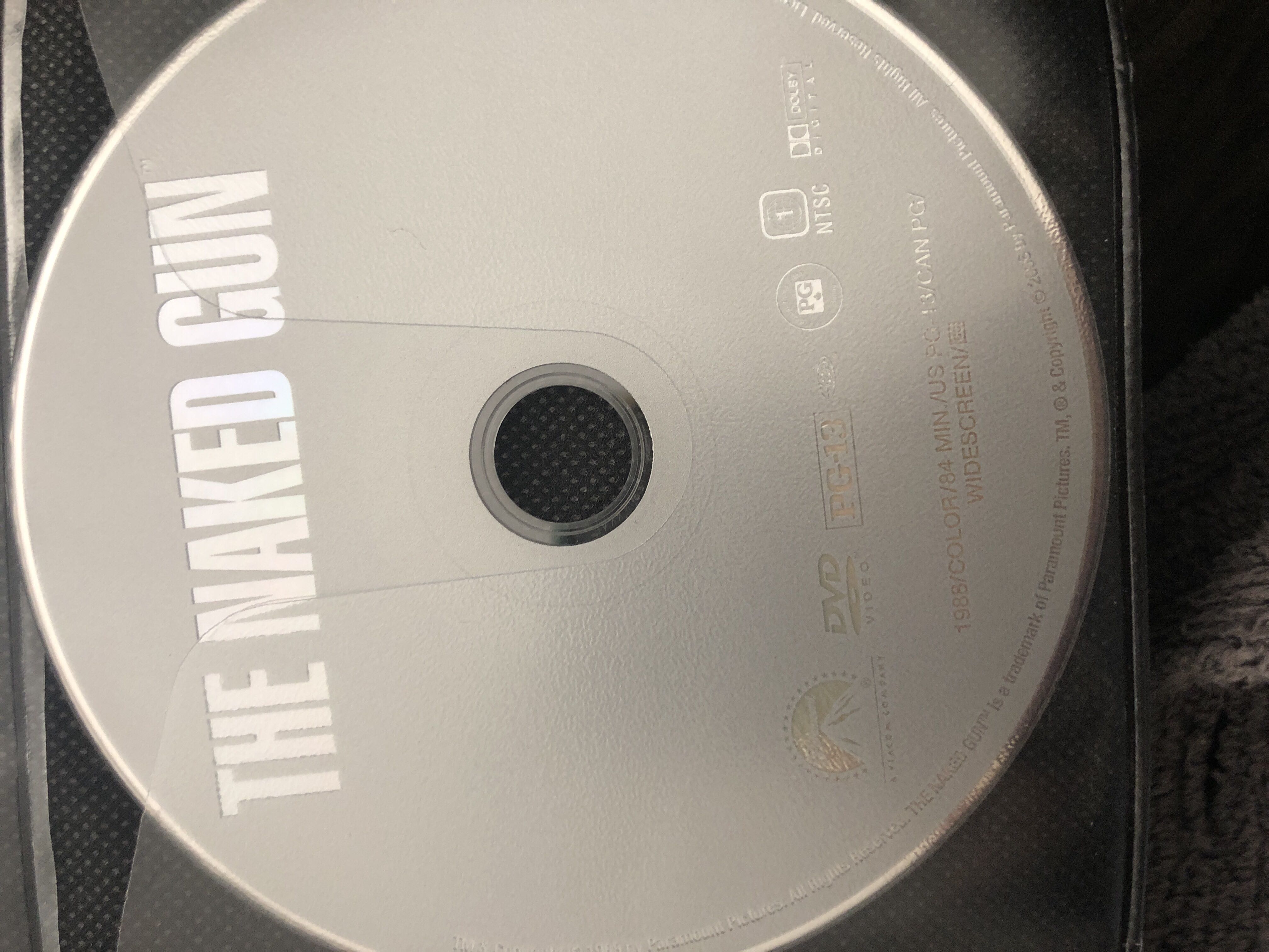 The Naked Gun: From the Files of Police Squad! Apple TV movie collectible [Barcode 097361384245] - Main Image 2