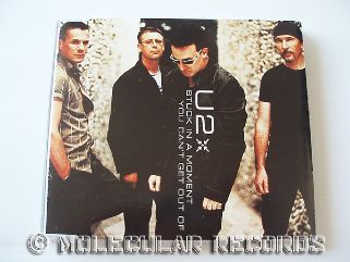 Casually Dressed & Deep In Conversation