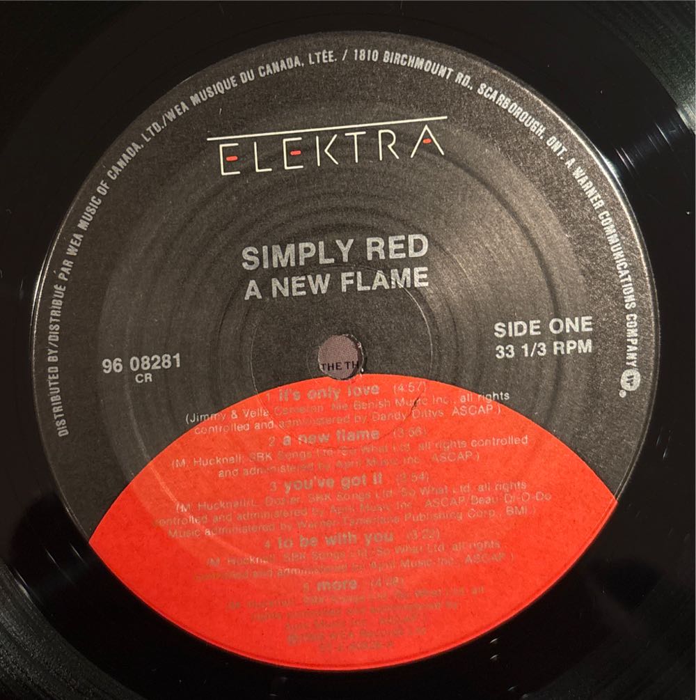 A New Flame - Simply Red (12”) music collectible [Barcode 075596082815] - Main Image 3