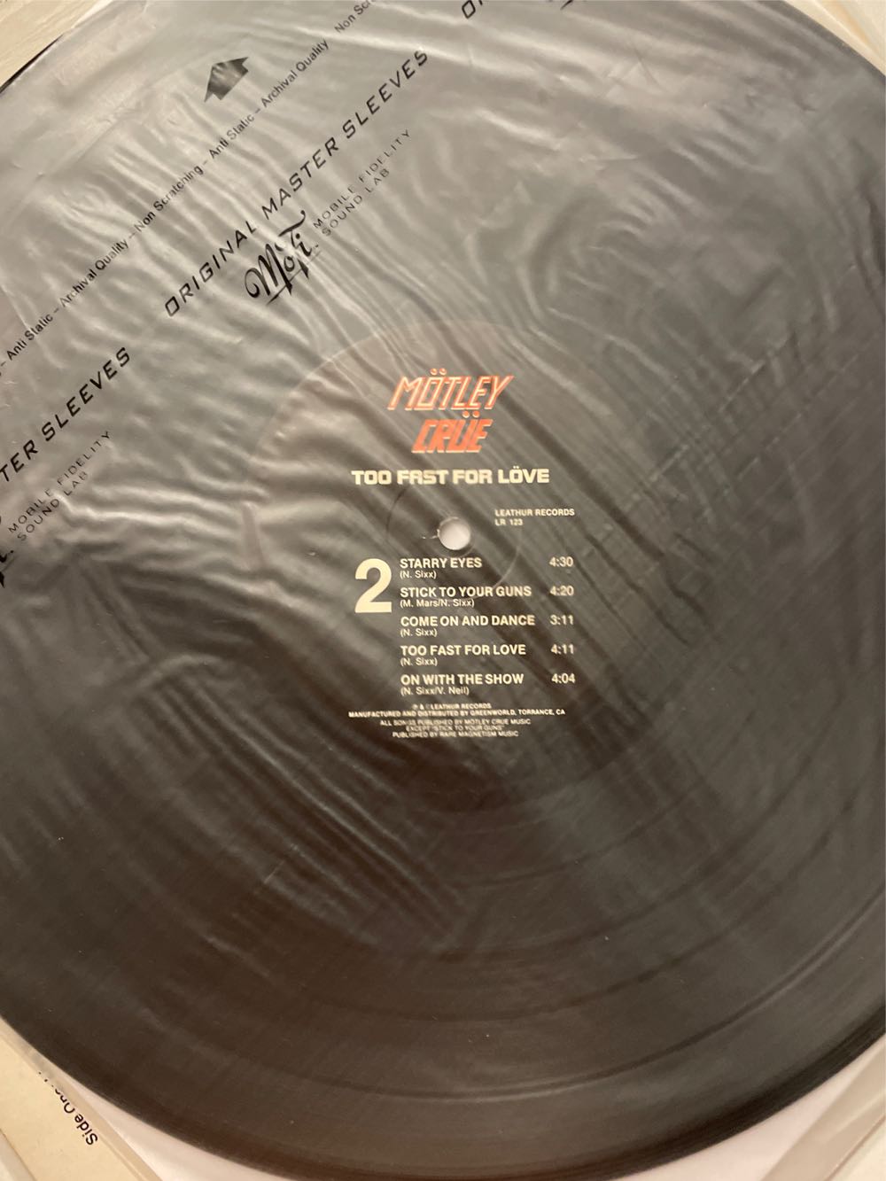 Too Fast For Love - Motley Crue (12”) music collectible [Barcode 846070030222] - Main Image 3