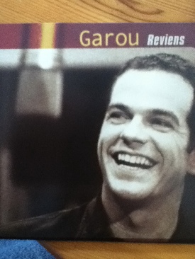 Garou Reviens - Garou (CD) music collectible [Barcode 696998101227] - Main Image 1