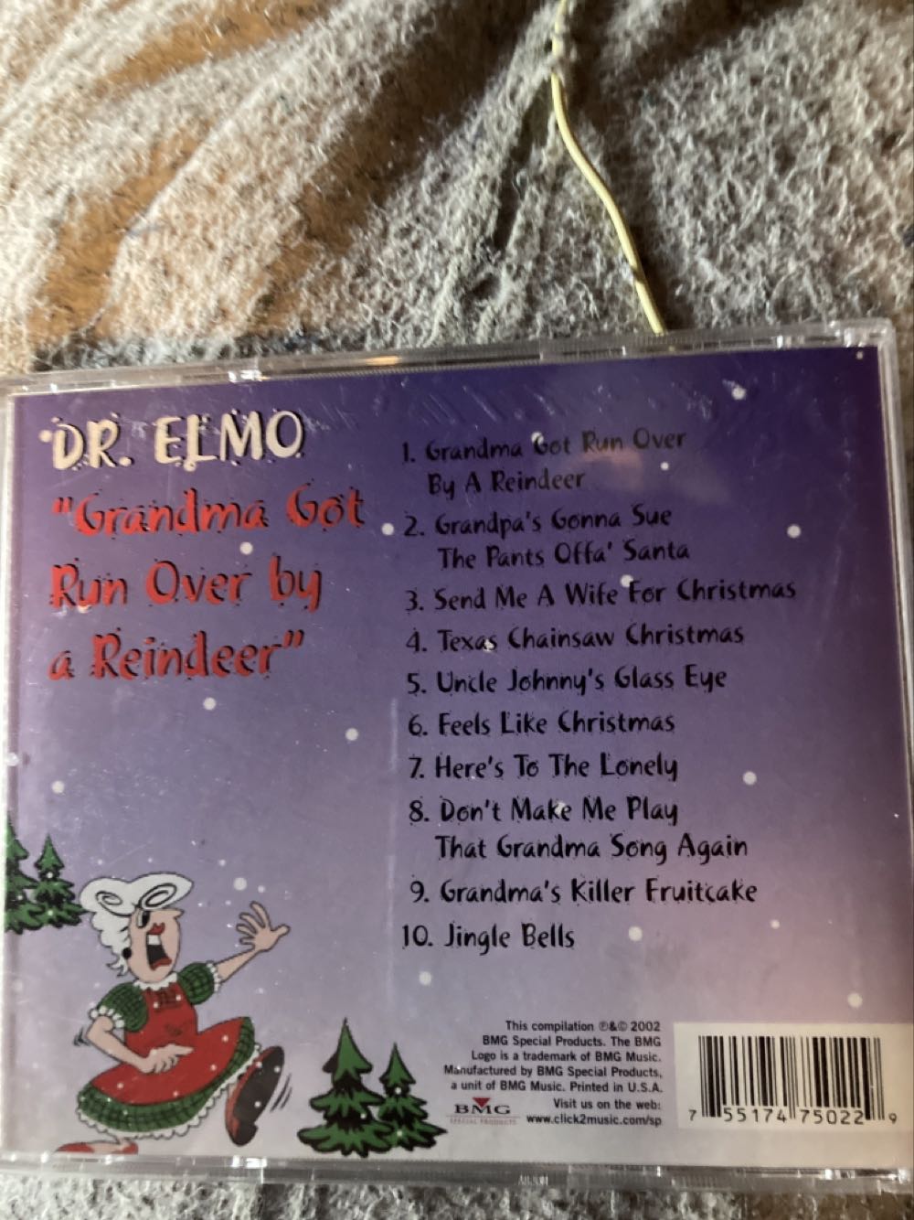 Grandma Got Run Over By A Reindeer - Dr. Elmo (CD - 31.53) music collectible [Barcode 755174750229] - Main Image 2