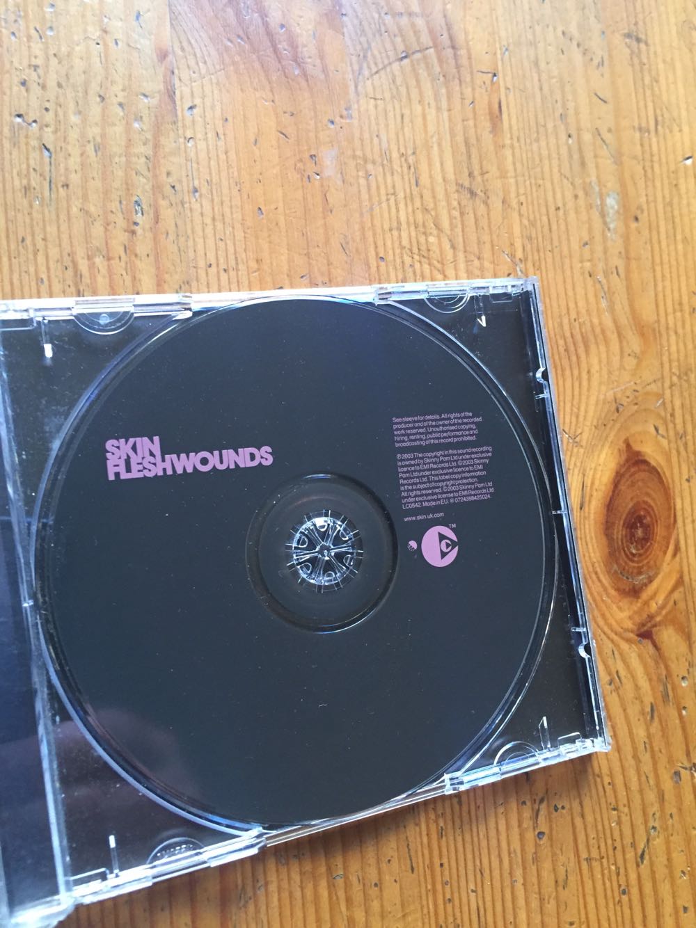 FleshWounds - Skin (CD-R - 44) music collectible [Barcode 724358425024] - Main Image 2