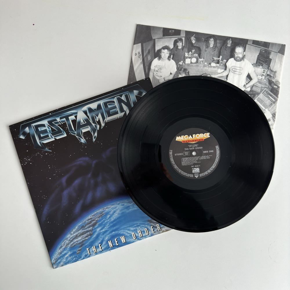The New Order - Testament (12” - 35) music collectible [Barcode 075678184918] - Main Image 2
