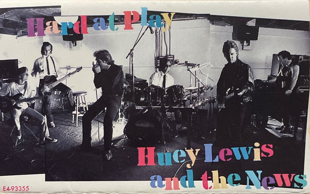 Hard at Play - Huey Lewis And The News (Cassette) music collectible [Barcode 077779335541] - Main Image 2