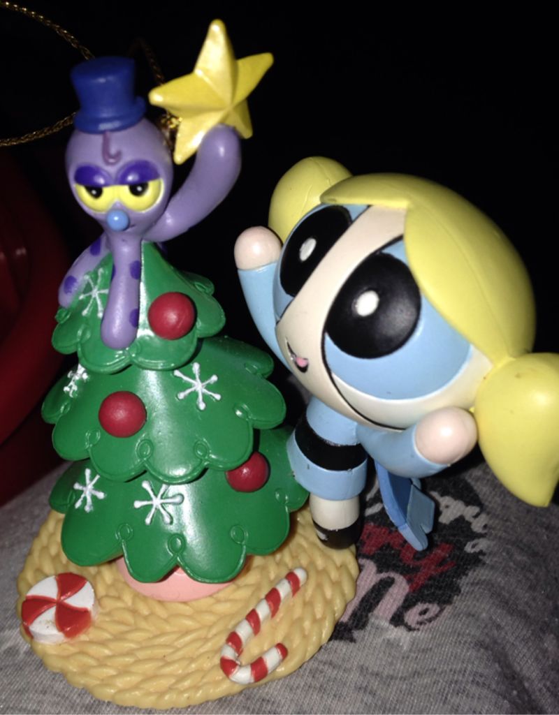 Tinkerbell Sitting On Flower 