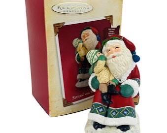 Sitting On Santa’s Lap  (Magic Light And Sound) ornament collectible - Main Image 3