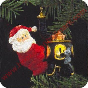 Keeping Cozy - Santa (Magic Lighted) ornament collectible - Main Image 1