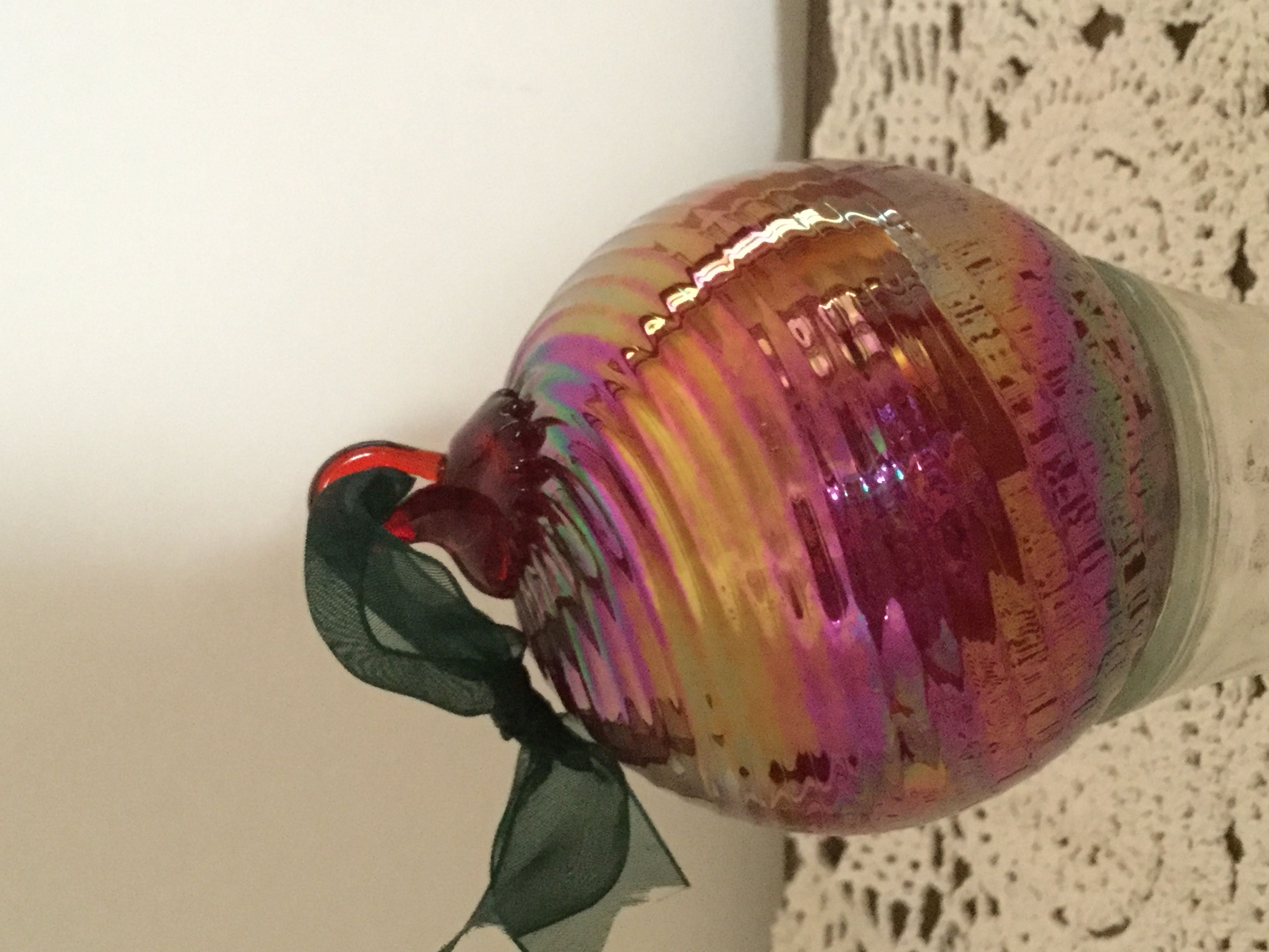 CA Silver ball with white swirls and raised red Dot