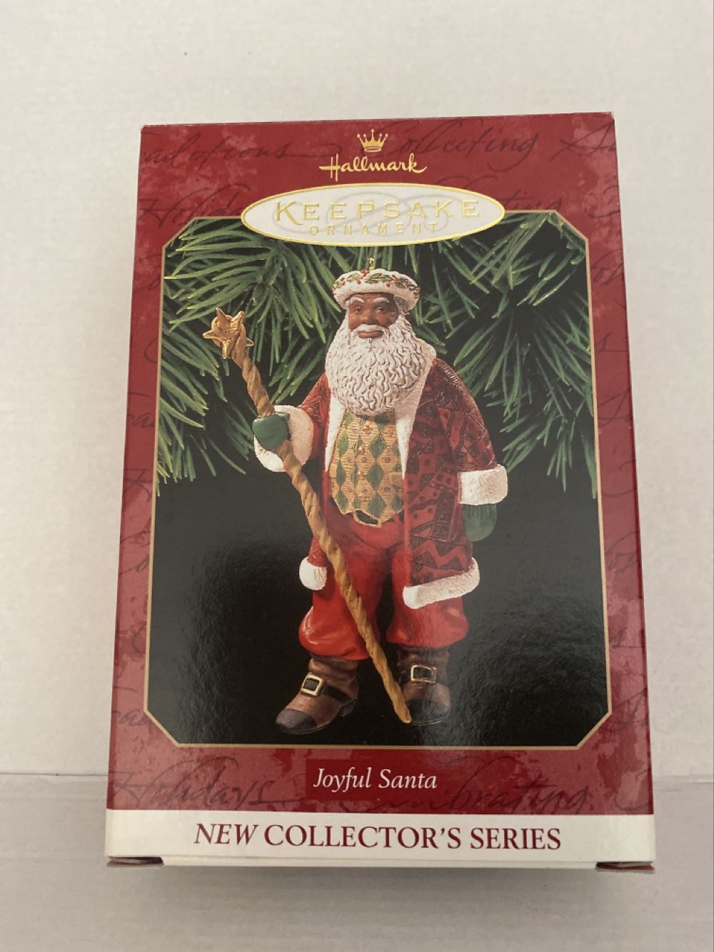 Snoopy On Top Of A Box Of Xmas Decorations