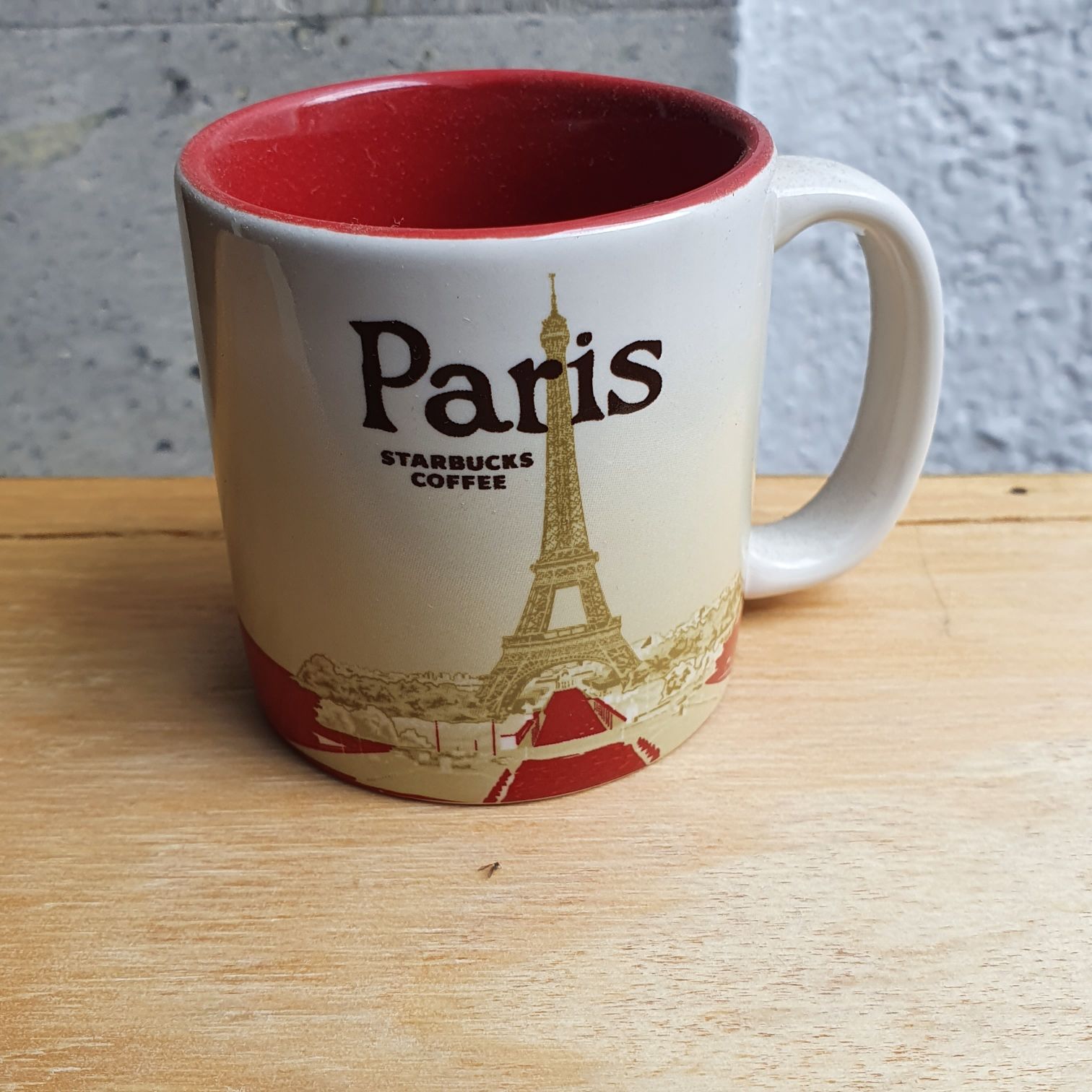 Tiny Silver Bird With Red And Blue Wings