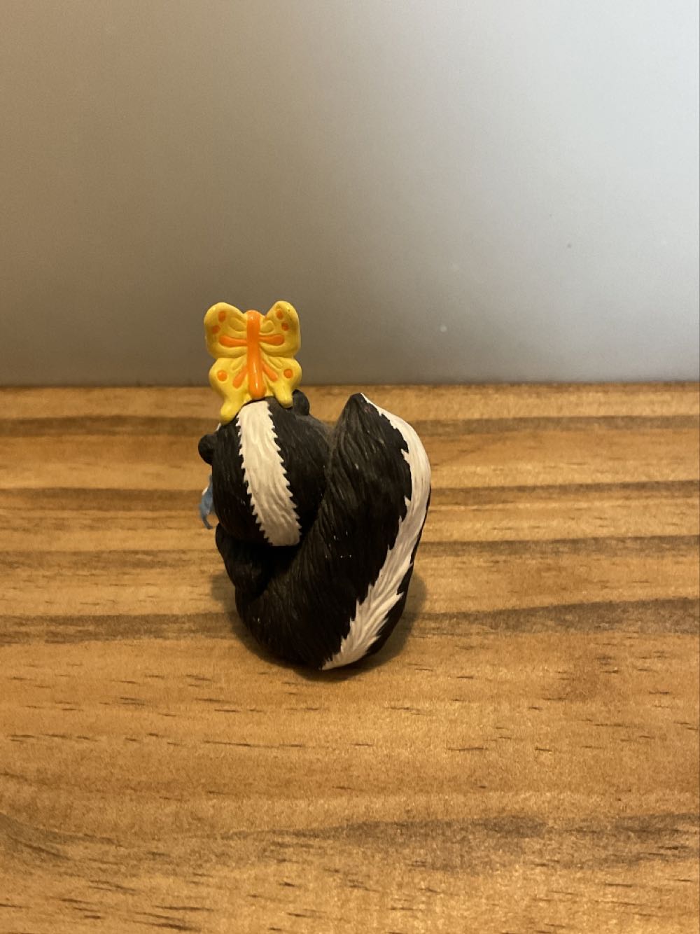 Skunk with butterfly  (Easter) ornament collectible - Main Image 2