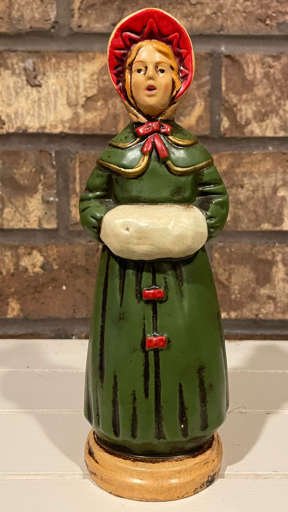 Caroler - Woman - Green Coat - Caroler (Music) ornament collectible - Main Image 1