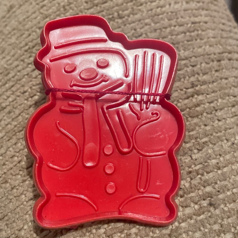 Bear Swinging From Snowflake