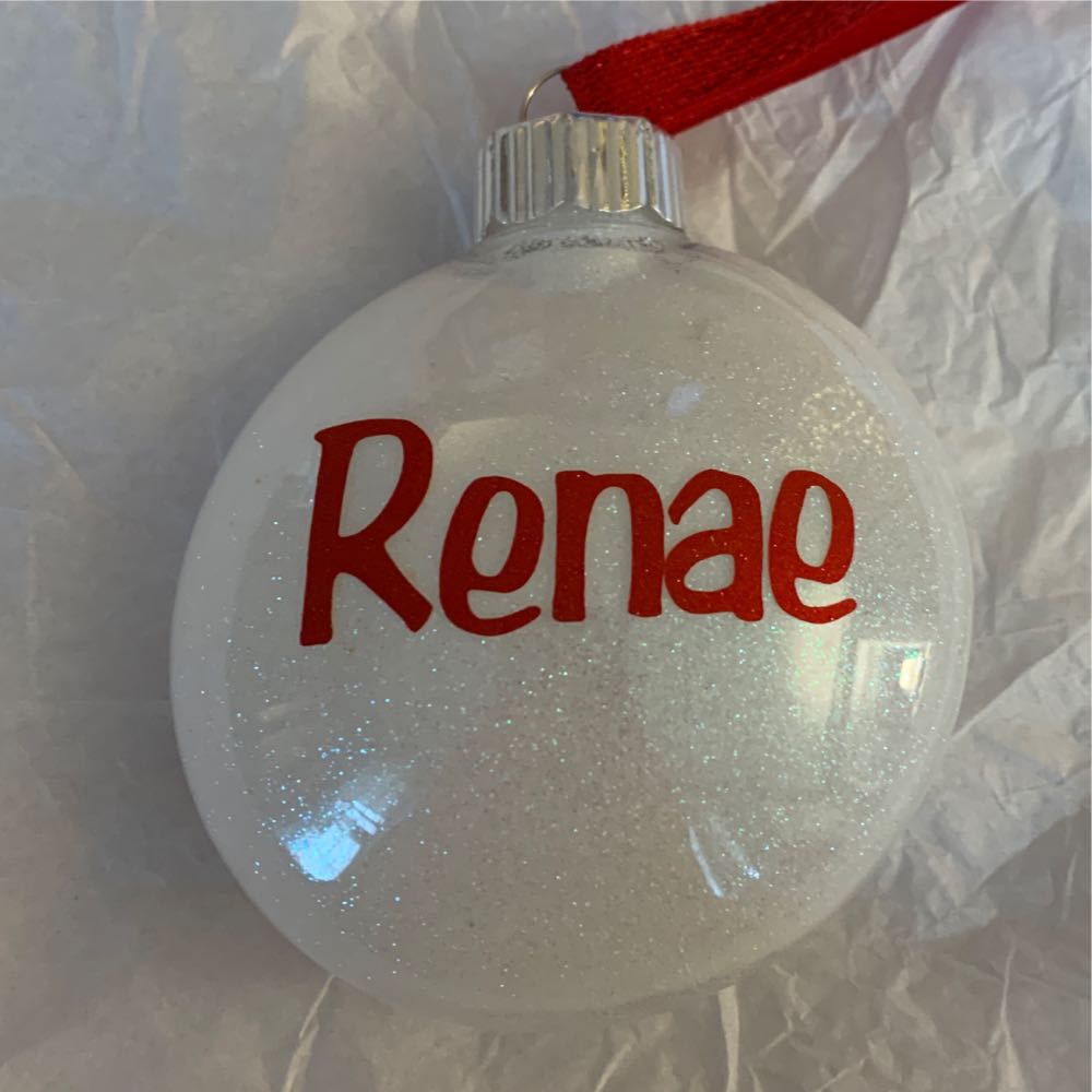 White Flattened Ball With Red “Renae”  ornament collectible - Main Image 1