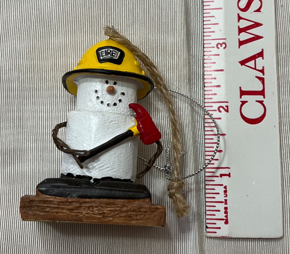 Birds on candy cane swing sign says Christmas is life