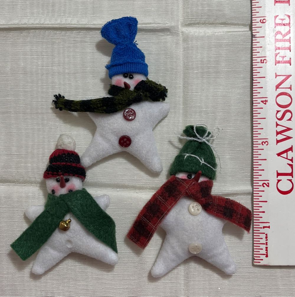 Birds on candy cane swing sign says Christmas is life