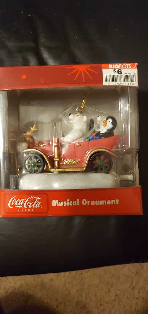 Tin W/red Ribbon At top