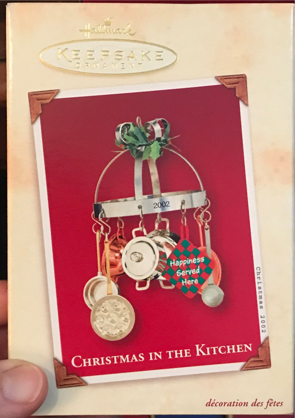 Tin W/red Ribbon At top