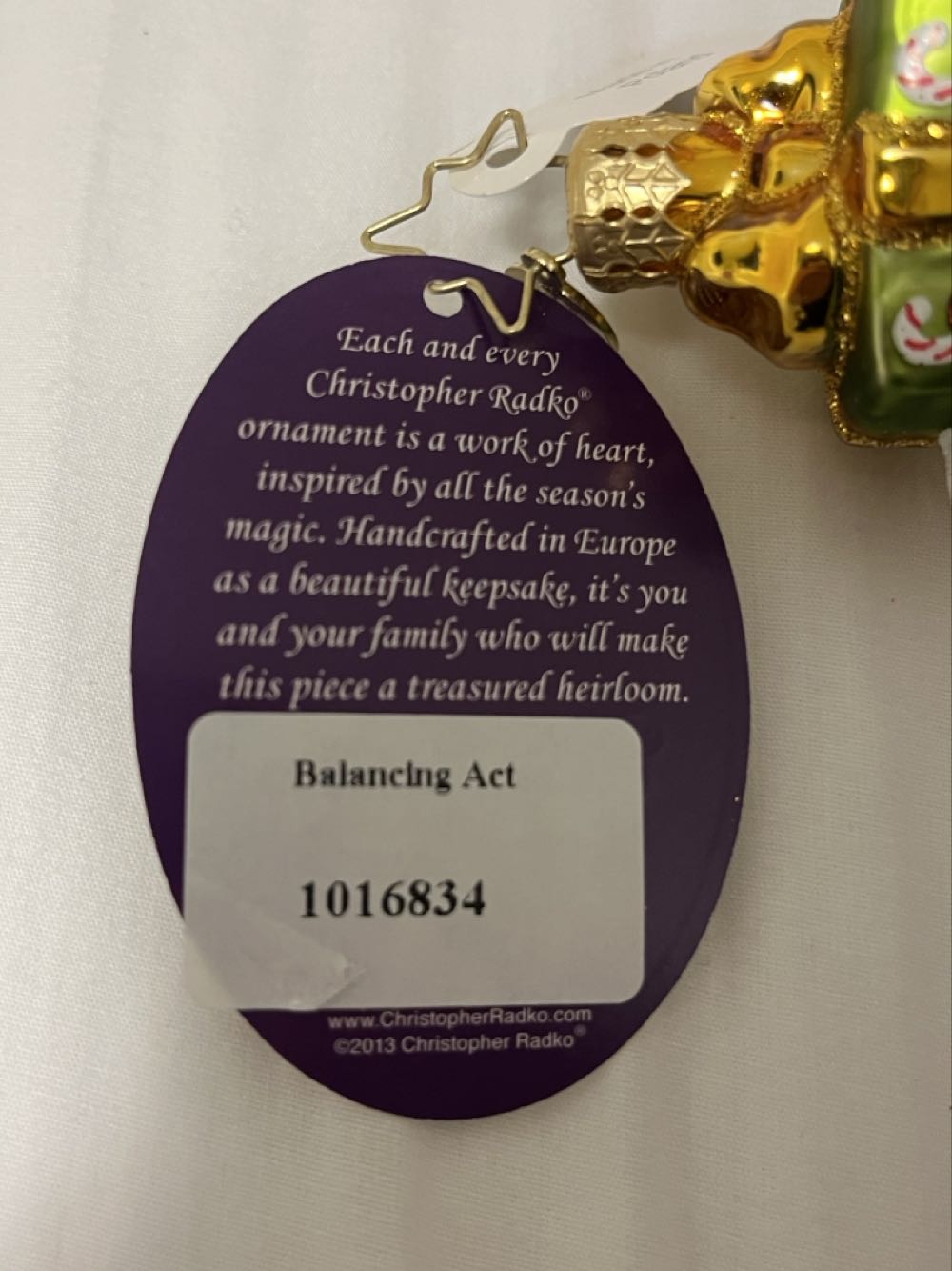 Balancing Act  (Santa Standing In A Present) ornament collectible - Main Image 3