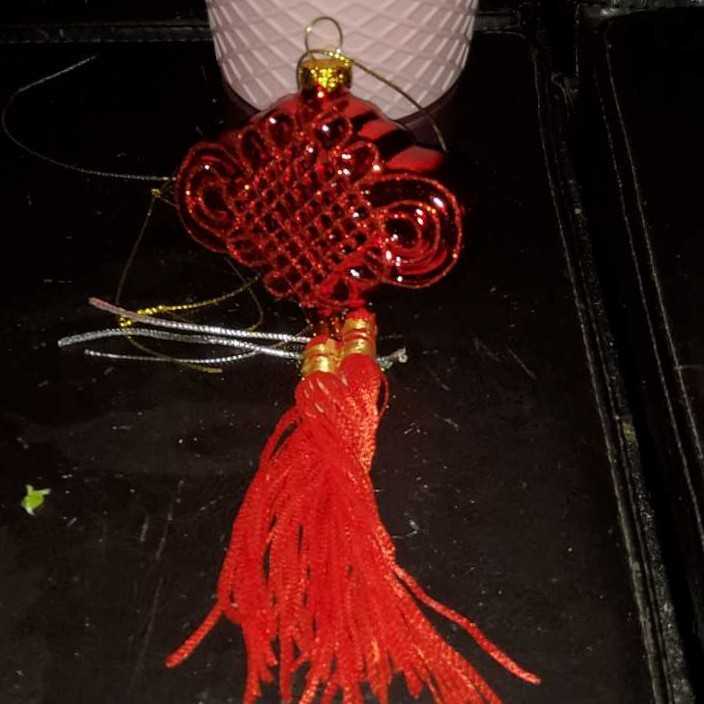 Shiny Burgundy Ball With Glitter Reindeer