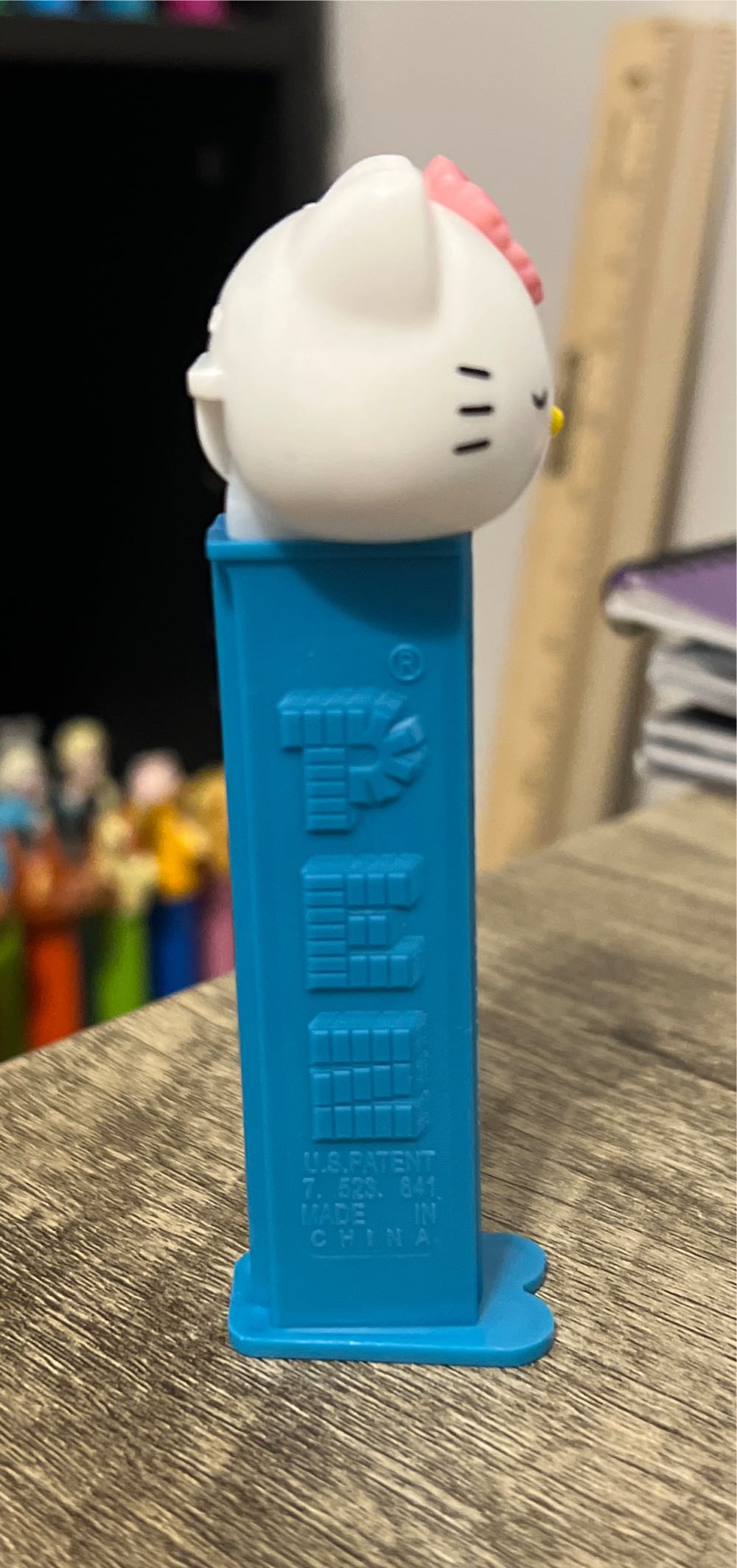 Hello Kitty - Hello Kitty head, pink flower, Namaste on teal stemp - Hello Kitty pez collectible - Main Image 2