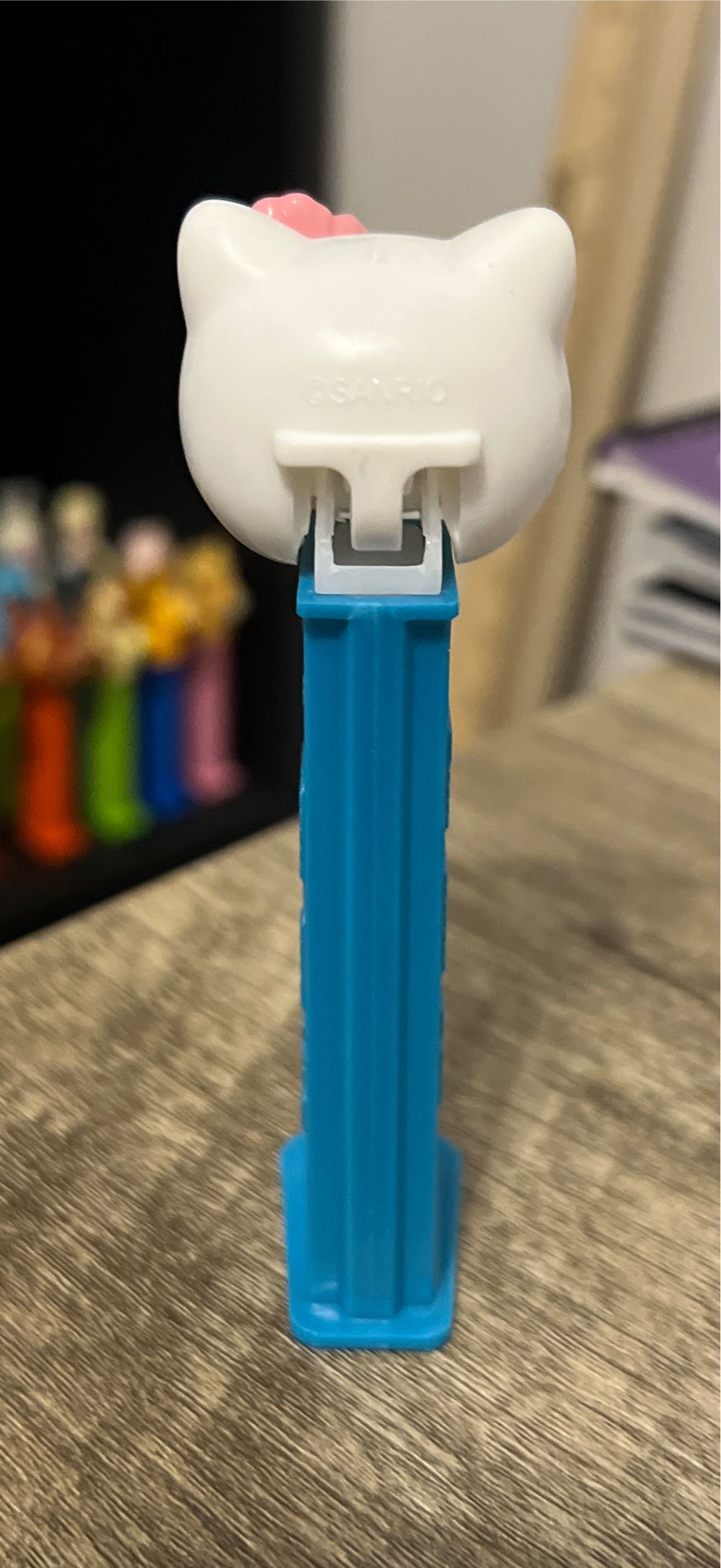 Hello Kitty - Hello Kitty head, pink flower, Namaste on teal stemp - Hello Kitty pez collectible - Main Image 3