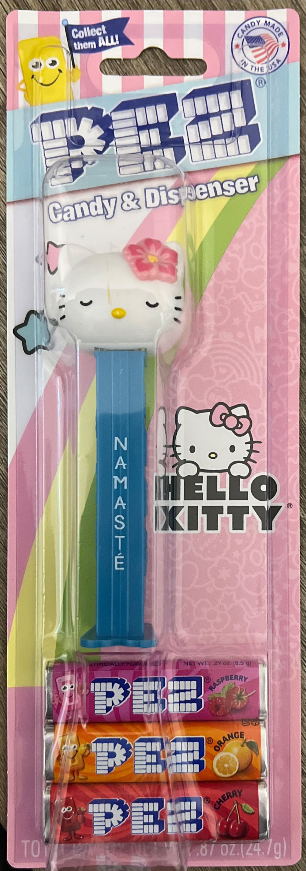 Hello Kitty - Hello Kitty head, pink flower, Namaste on teal stemp - Hello Kitty pez collectible - Main Image 4