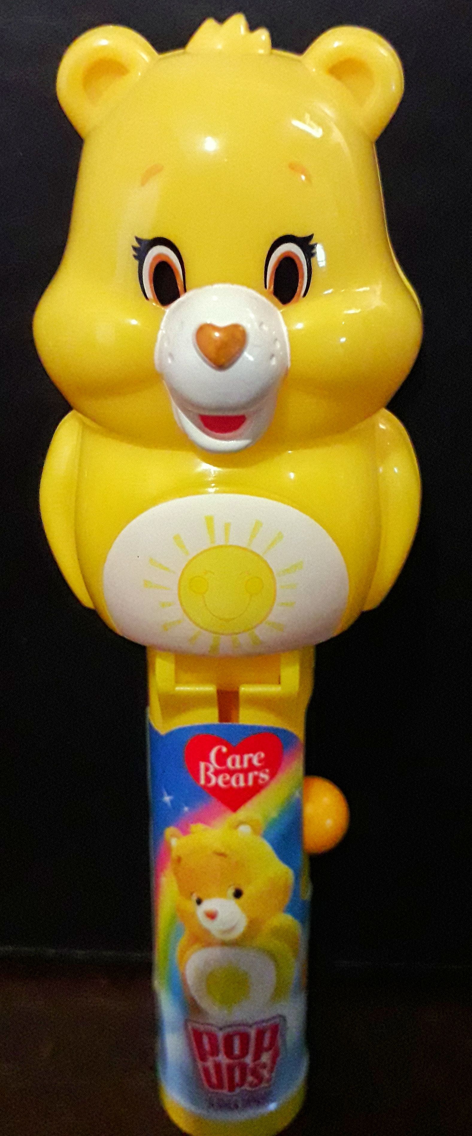 Pop Ups! - Yellow Carebear  pez collectible - Main Image 1