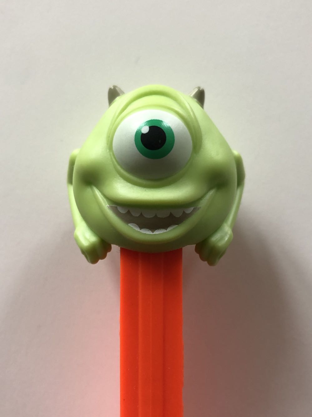 Pez - Regular Remake, purple pull-back, purple stem, larger white pin on side