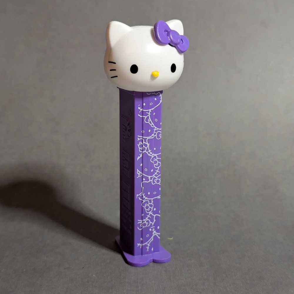Hello Kitty - Hello Kitty head, purple bow, white kitties on purple stem - Hello Kitty pez collectible - Main Image 2