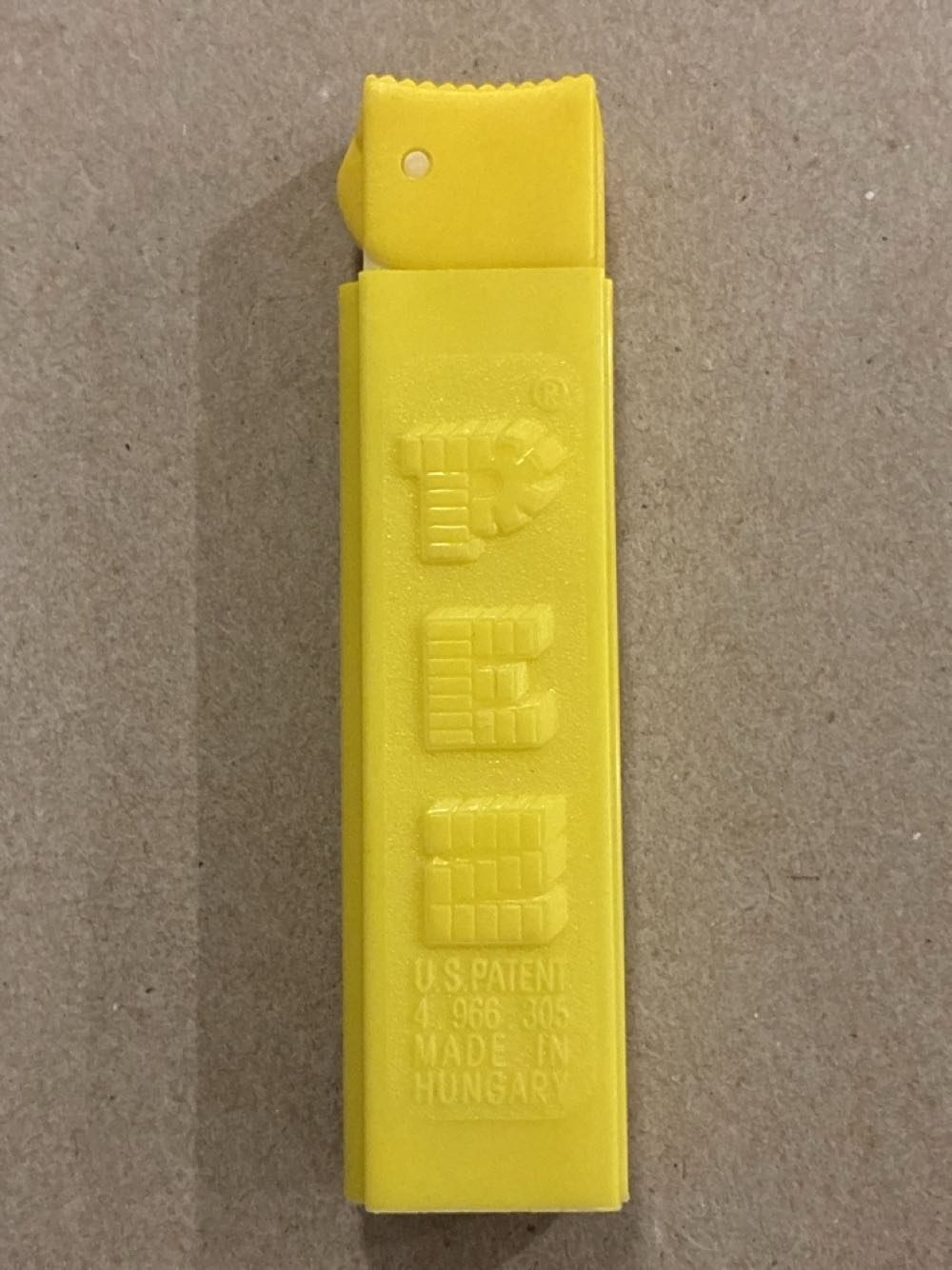 PEZ Yellow Stem Dispenser (U.S. Patent 4,966,305) Made in Hungary - PEZ / novelty candy dispenser pez collectible - Main Image 2