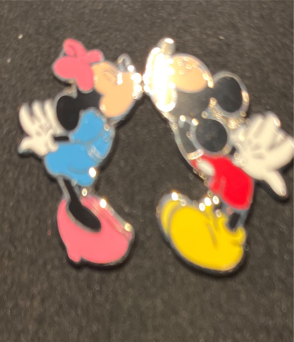 Mickey Mouse Playing Flute On Carpet