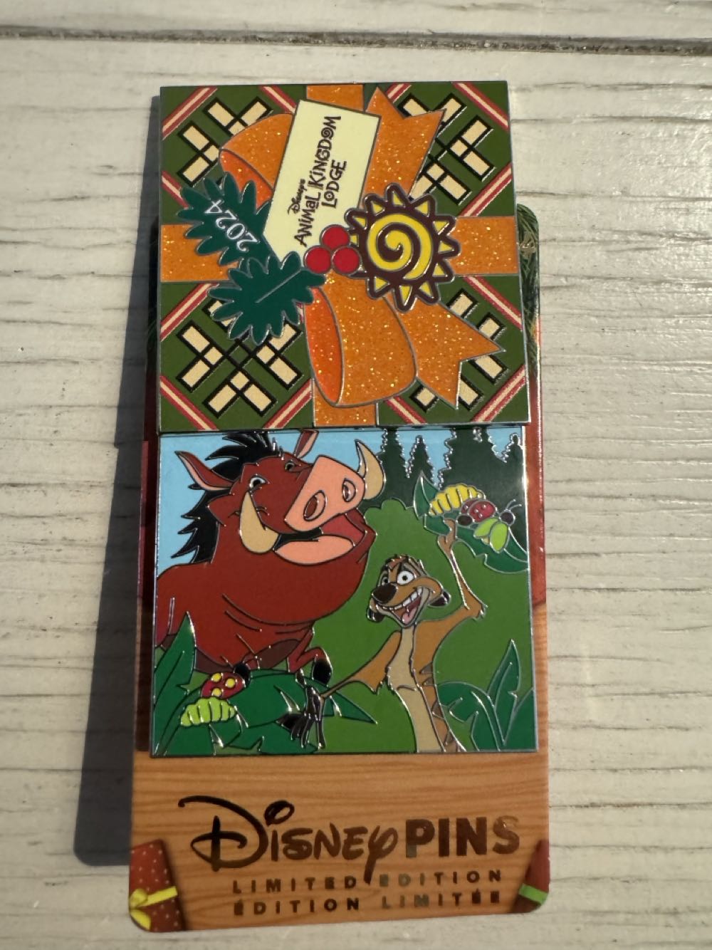Christmas 2024 Animal Kingdom Lodge. Christmas Present, Pumbaa And Ramona - Hotel pin collectible [Barcode 400983671080] - Main Image 2