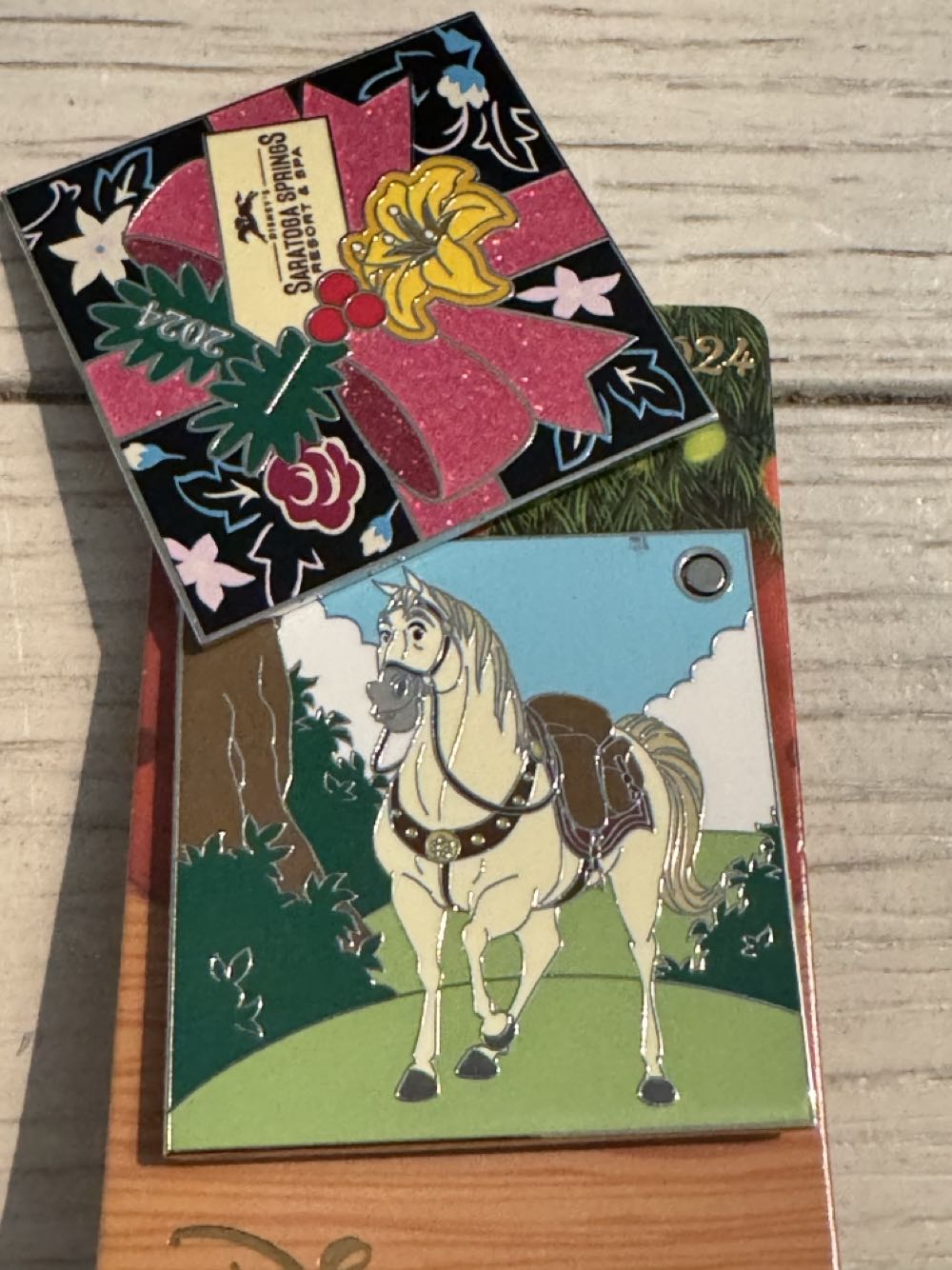 Christmas 2024 Saratoga Springs Resort & Spa, Christened present, Maximus - Hotel pin collectible [Barcode 400983670519] - Main Image 2