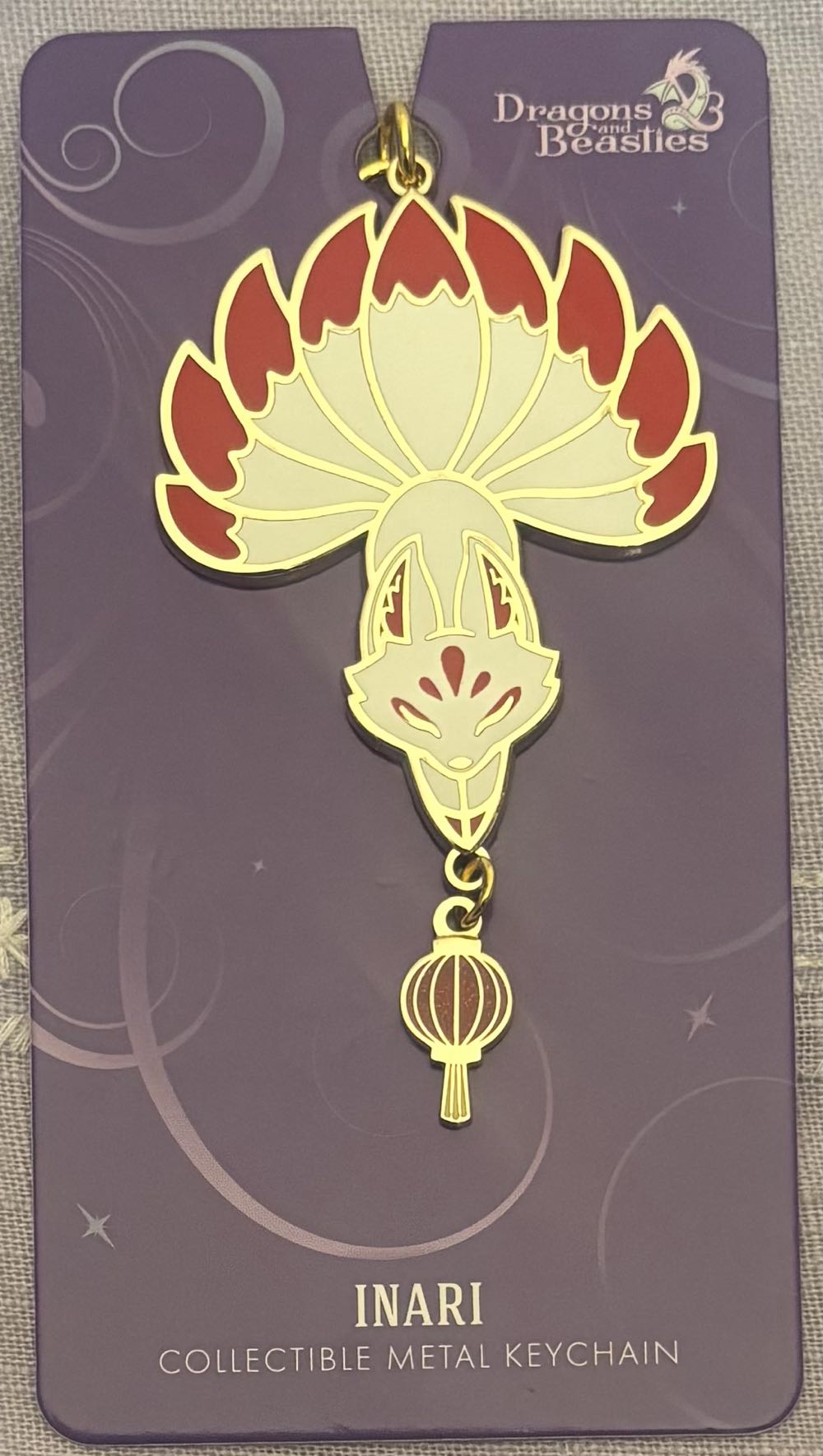 D&B INARI - DELUXE METAL KEYCHAIN - Gold Plated Hard Enamel pin collectible [Barcode 810002712708] - Main Image 2