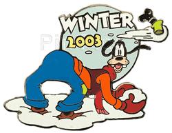 goofy has something in his hand