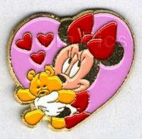 Mickey tapping his foot with hands behind back