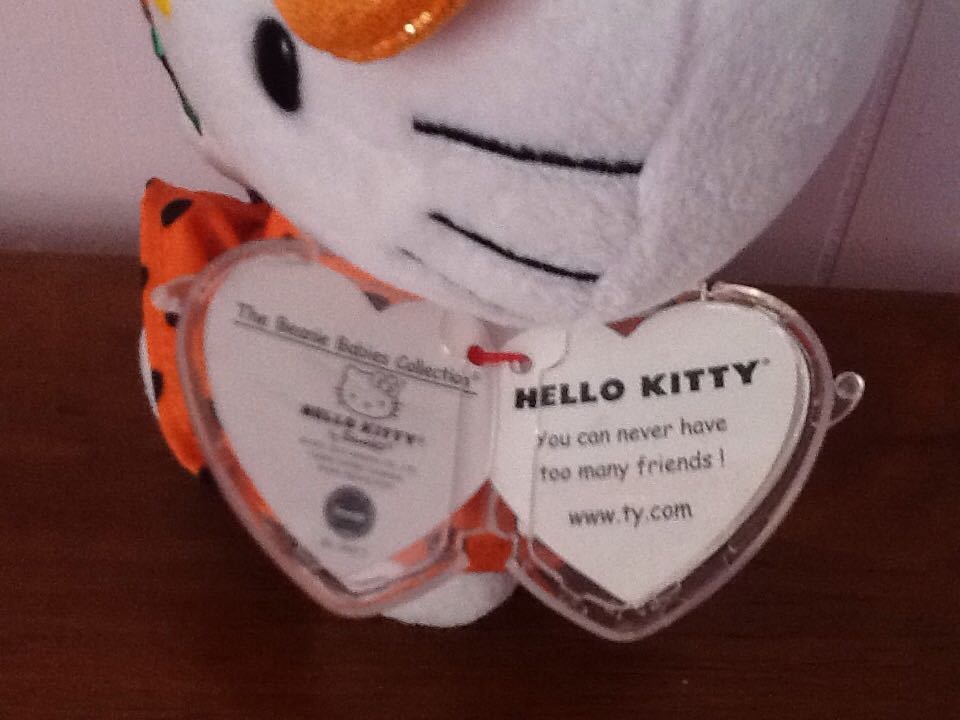 Hello Kitty - Halloween Orange Polka Dot Dress Holding Pumpkin Sucker  plush collectible [Barcode 008421410095] - Main Image 2