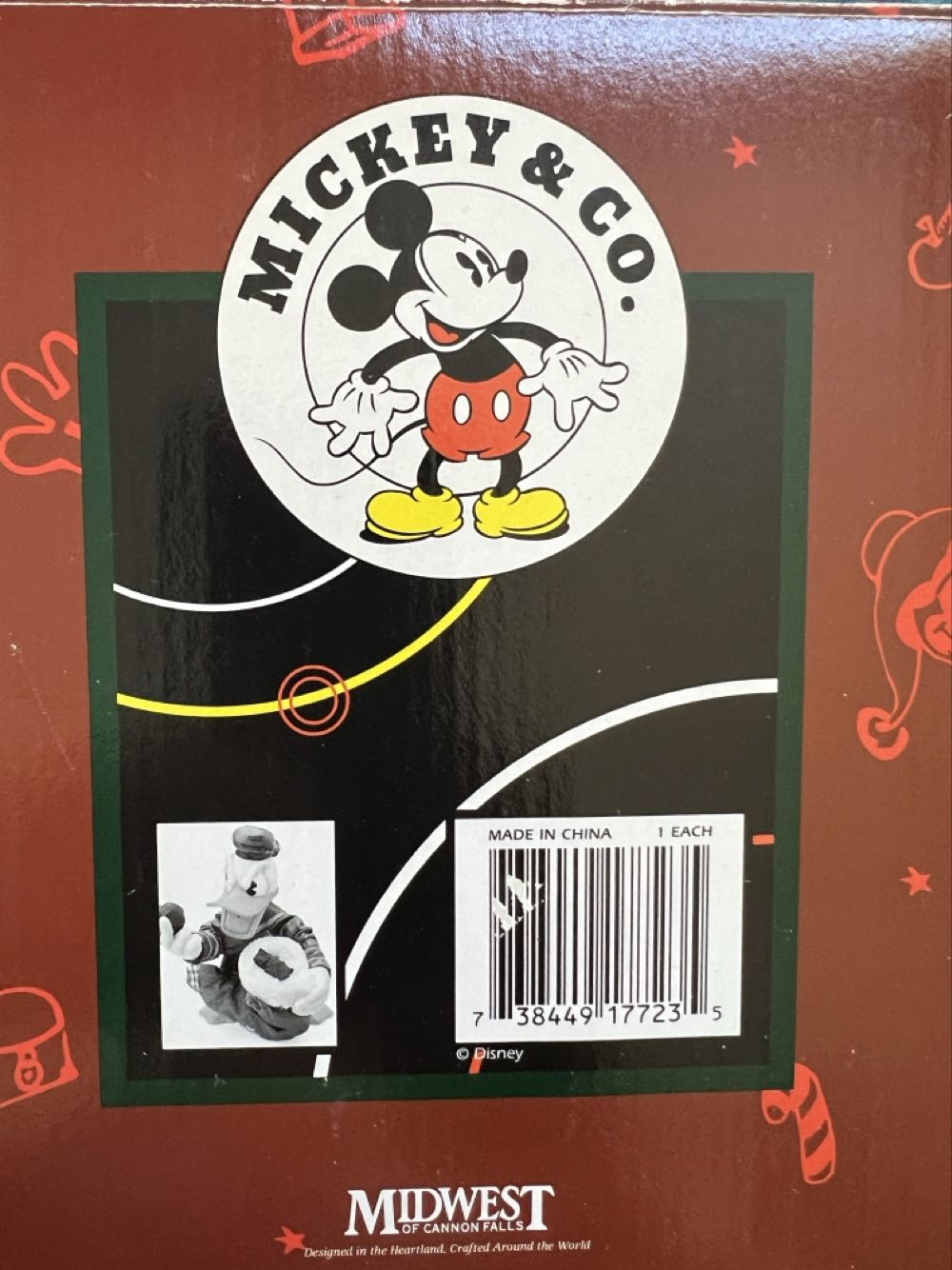 189)   Mickey & co, fabric Mache figurine. Donald Duck holding a stocking full of coal. Measures 7” and comes in its original box.   plush collectible - Main Image 3