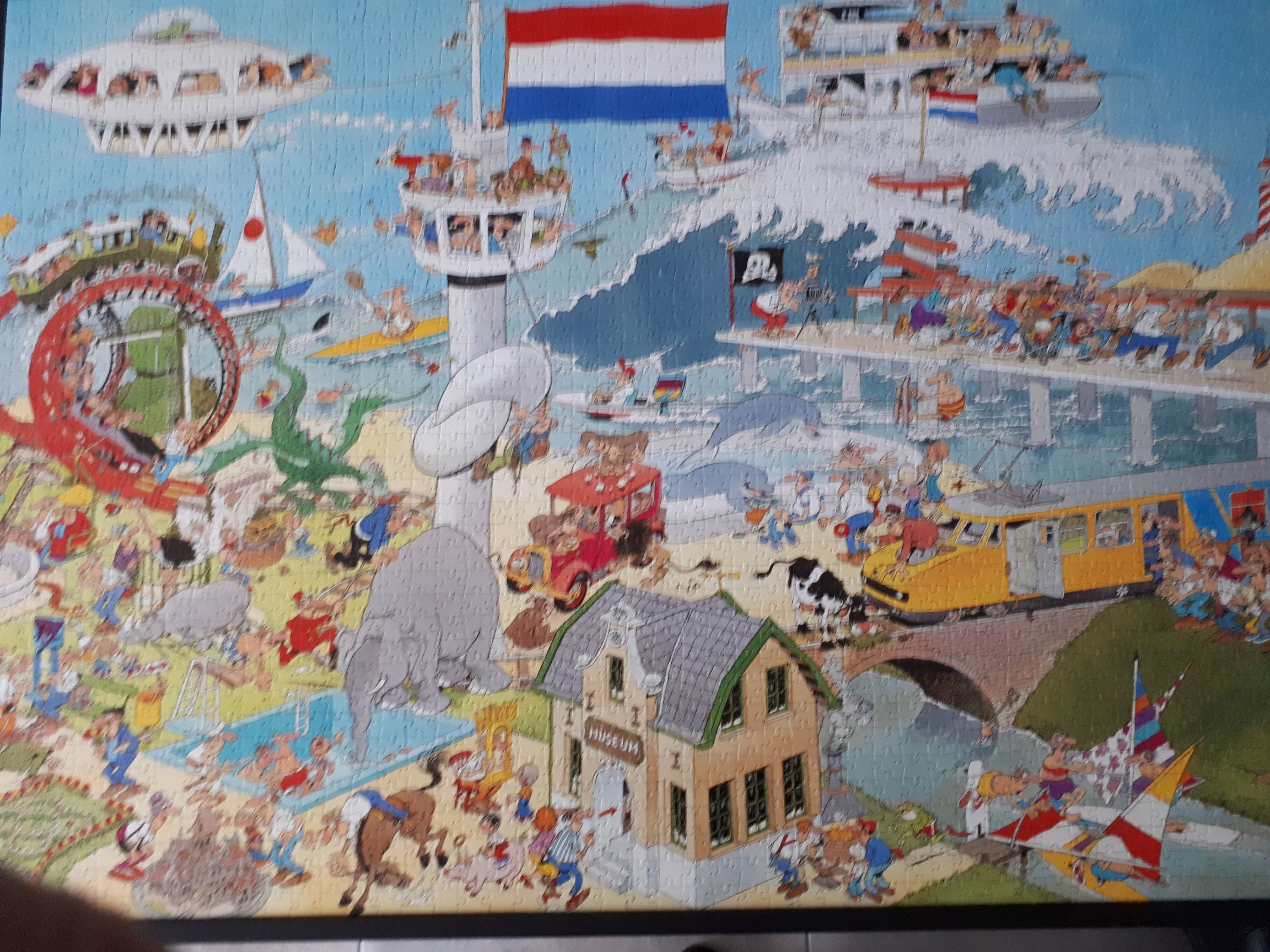 81421, Te land, ter zee, in de lucht - Jumbo 1000 puzzle collectible - Main Image 2