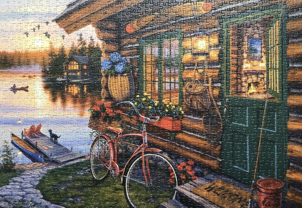 Lakeside Cabin with Bike - Schmidt puzzle collectible [Barcode 4001504585310] - Main Image 2