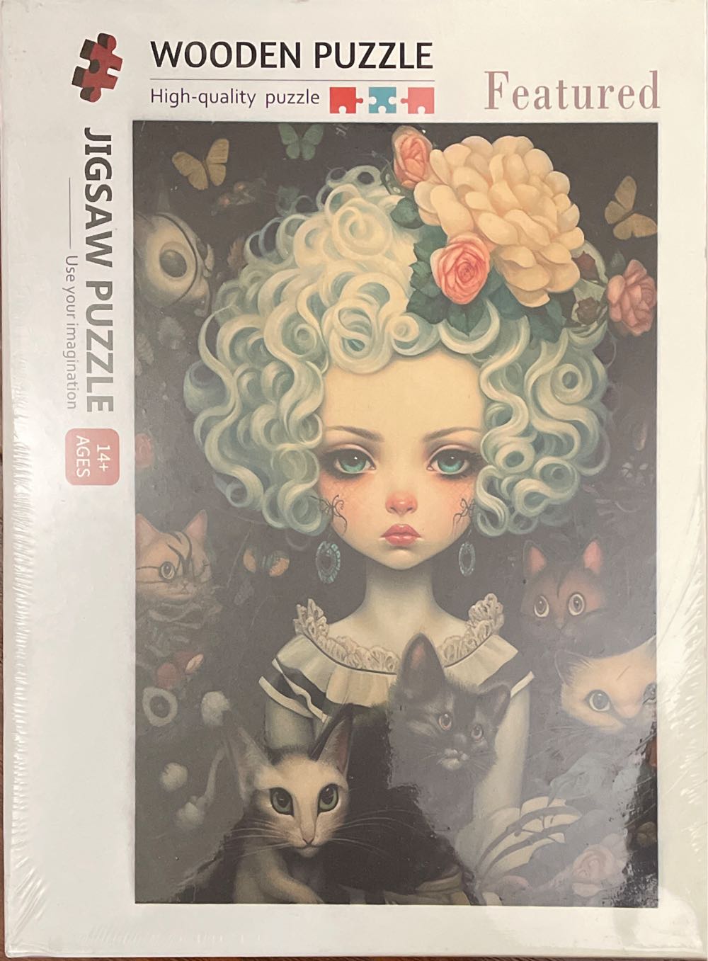 Curly-Haired Doll & Cats - Tucocoo puzzle collectible - Main Image 1