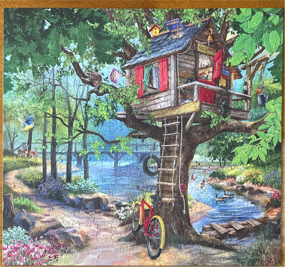 River Tree House - SunsOut 🇺🇸 puzzle collectible [Barcode 796780319684] - Main Image 2