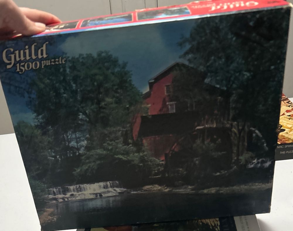 Sports Mountain Climber At The Peak