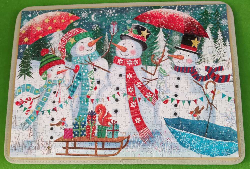 Snowman Family And Village Duo - Cancer Research Uk puzzle collectible [Barcode 5056238555350] - Main Image 2