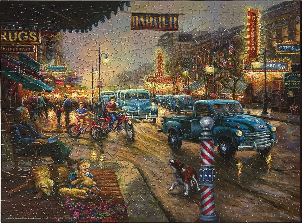 A Bustling Saturday Night - SunsOut puzzle collectible [Barcode 796780420663] - Main Image 3