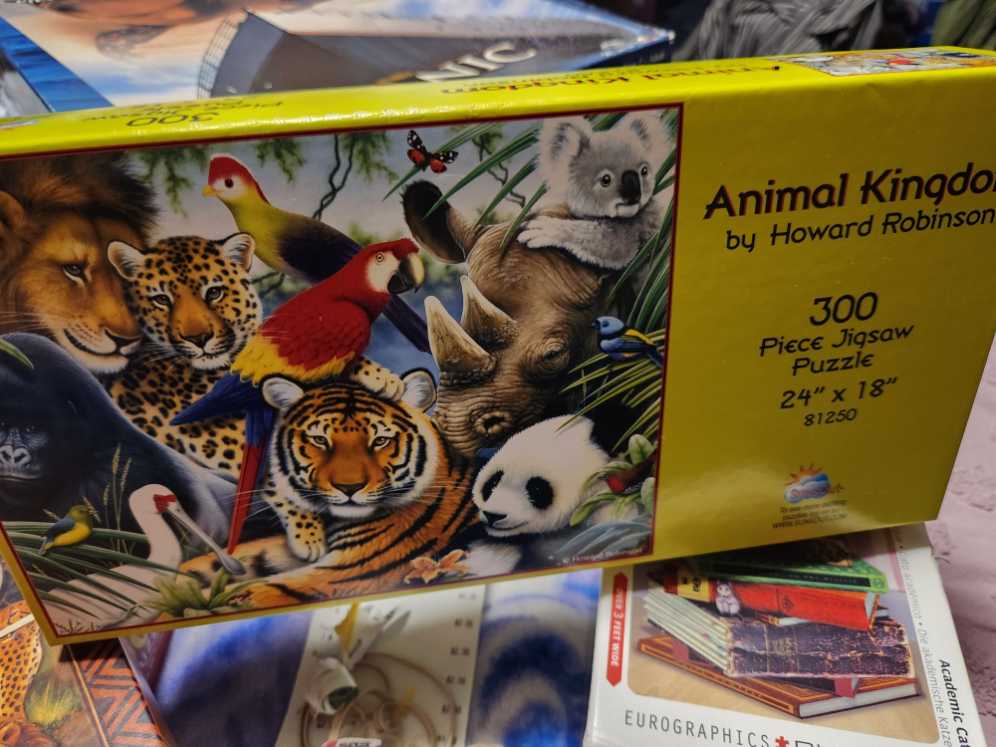 Animal Kingdom - SunsOut puzzle collectible [Barcode 796780812505] - Main Image 2