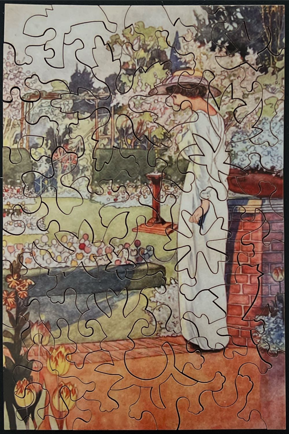Garden Lady - SOLD - Nautilus Puzzles puzzle collectible - Main Image 2