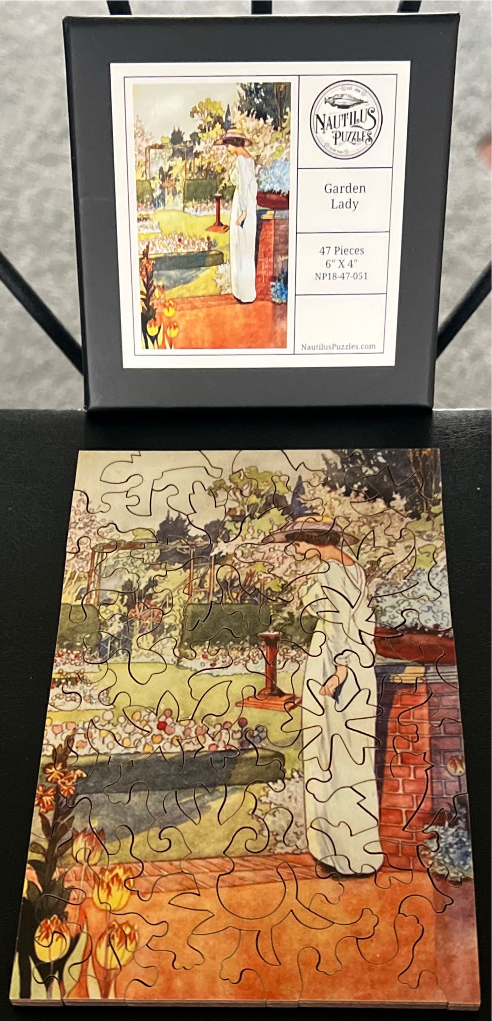 Garden Lady - SOLD - Nautilus Puzzles puzzle collectible - Main Image 3